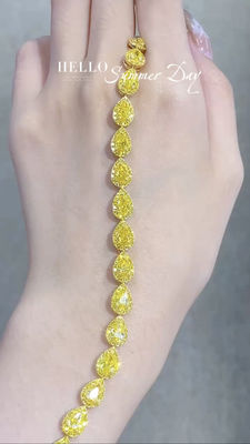 Un bracelet de tennis en diamant jaune VS Clarity T13.68ct